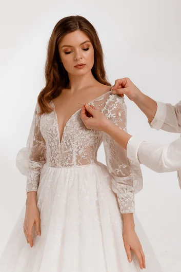Beautiful bride in wedding dress with expertly altered neckline for perfect coverage